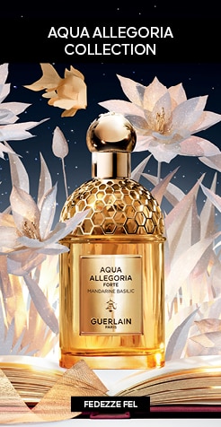 Guerlain Aqua Allegoria Forte Mandarine Basilic parfüm arany kupakkal és méhsejtmintás üvegben, papírvirág dekorációval csillagos háttér előtt.